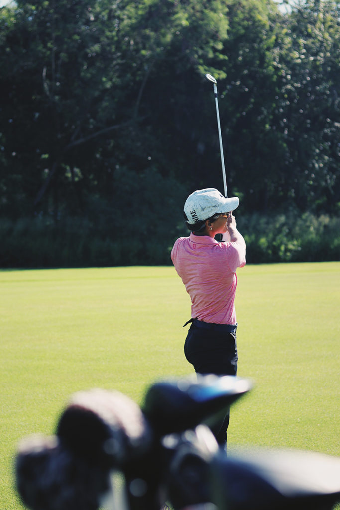 Karina Sanchez playing golf